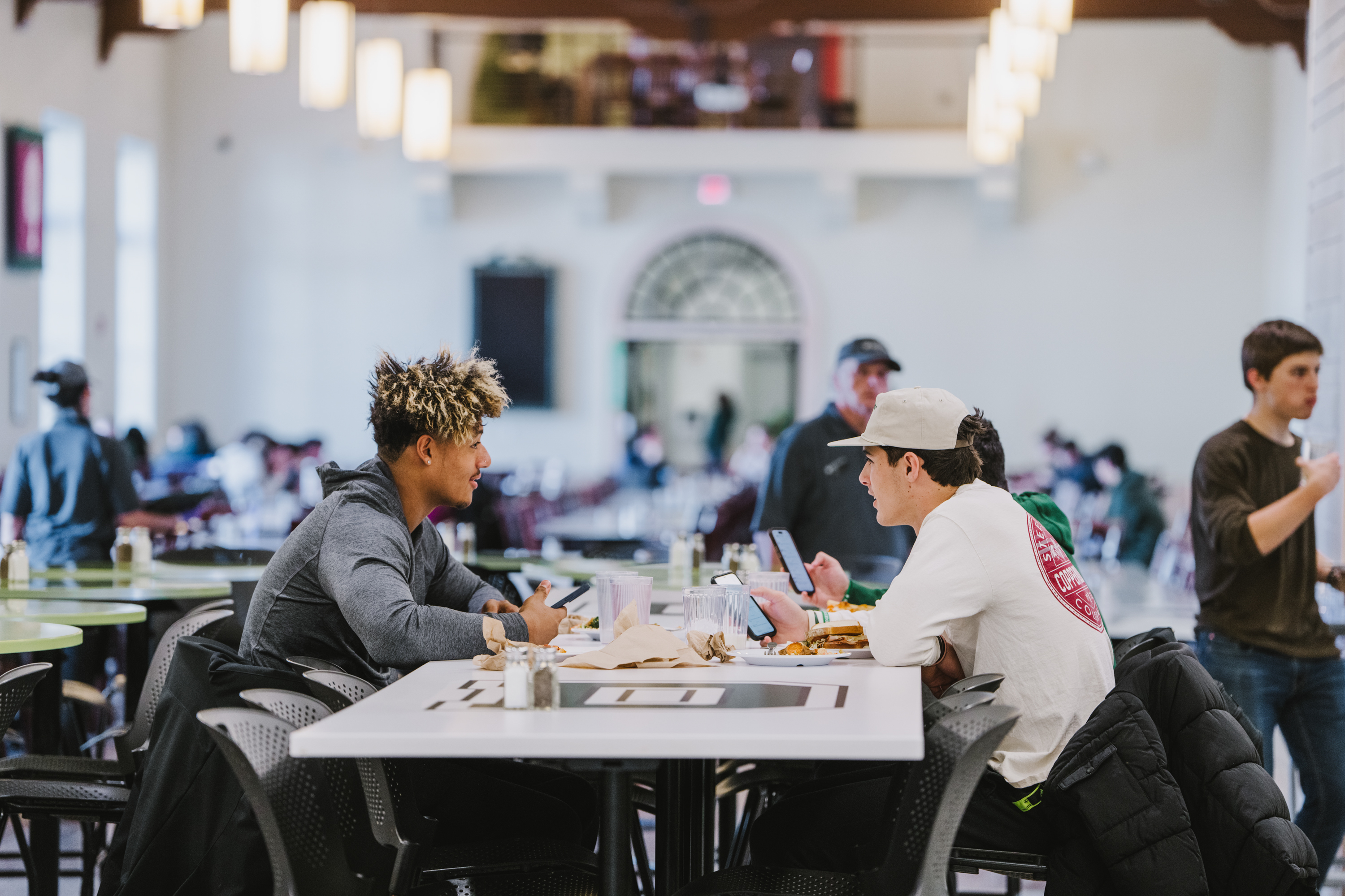 Students at a table talking