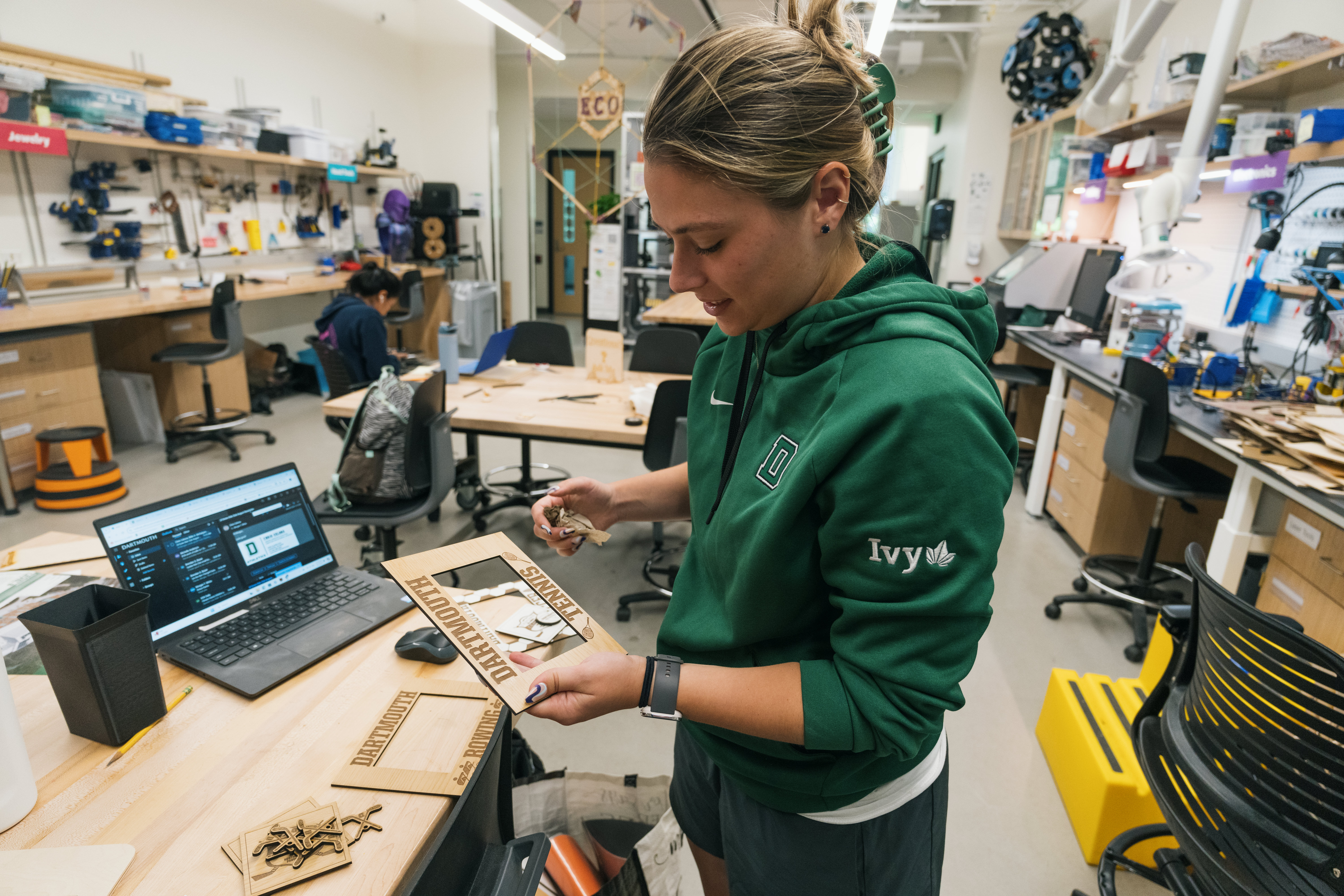 Morgan White works on a wood project