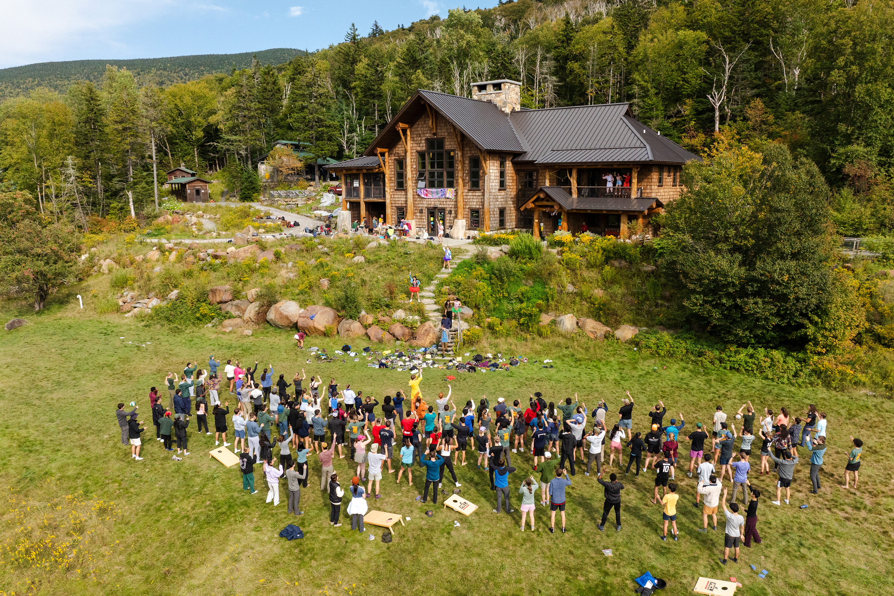 A group of student outside the lodge