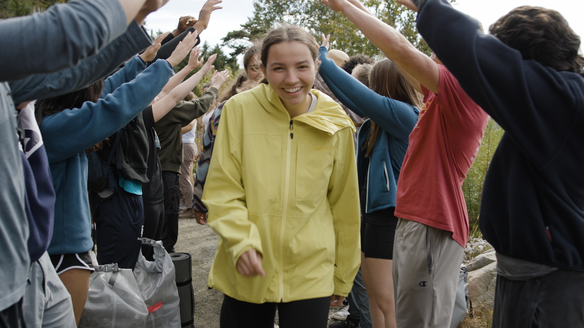 Student walking towards camera
