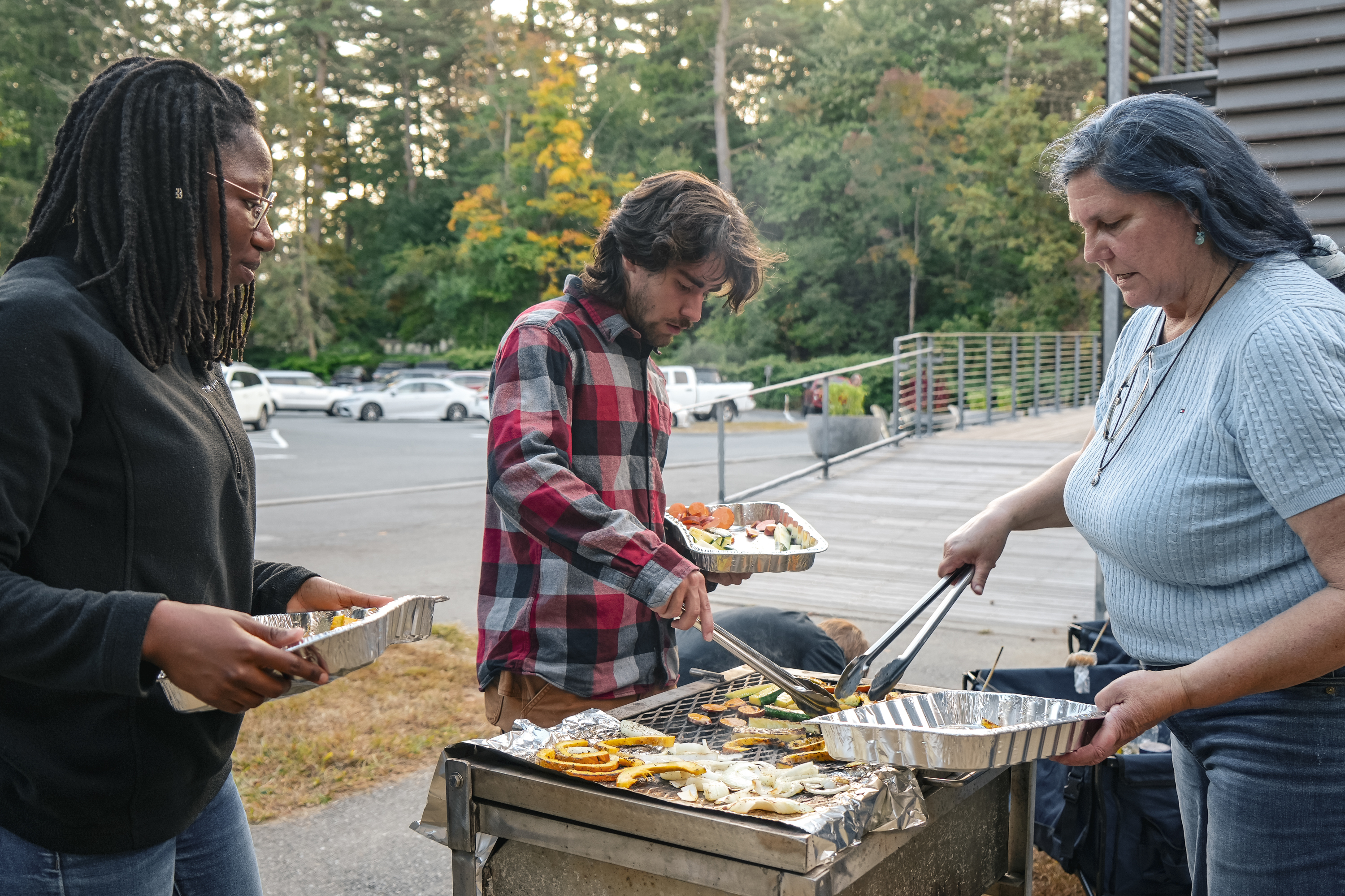 People preparing vegetables