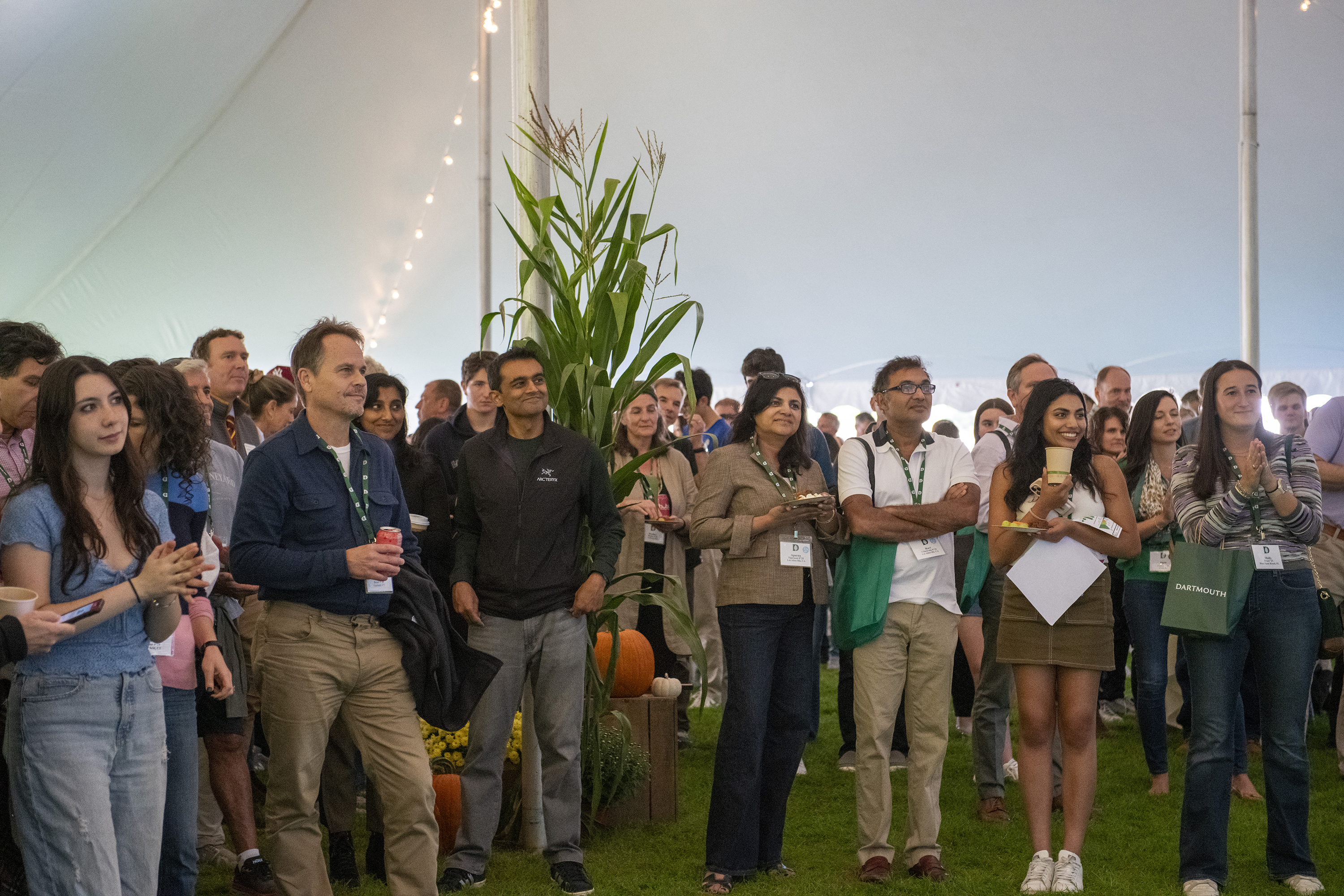 Parents in a tent gather during Dartmouth Family Weekend