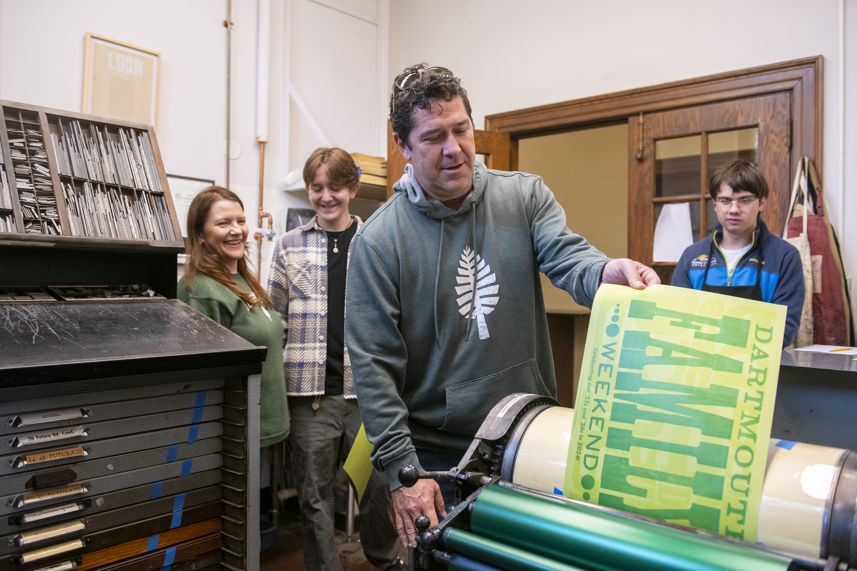 Dartmouth families print a poster in the Book Arts