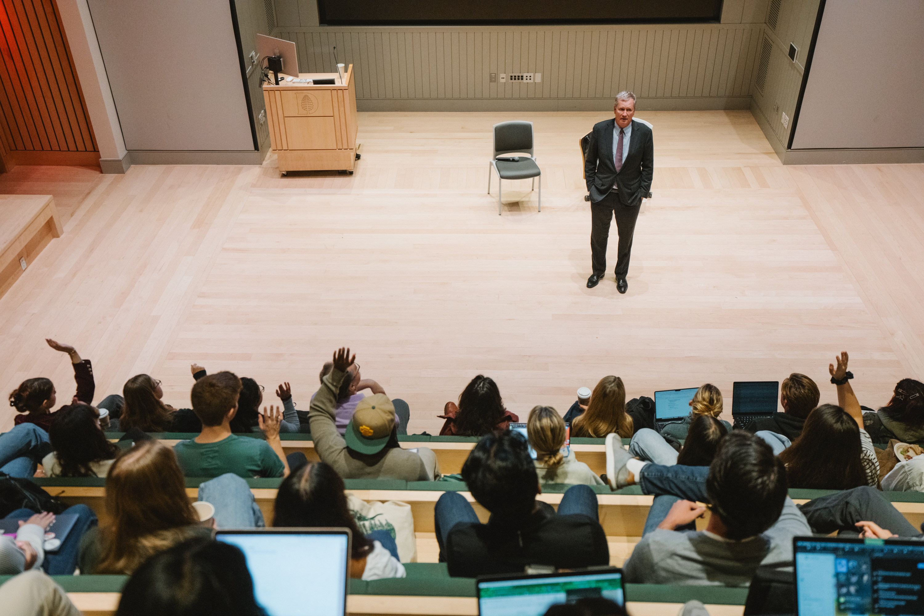 Michael Burns talking to students