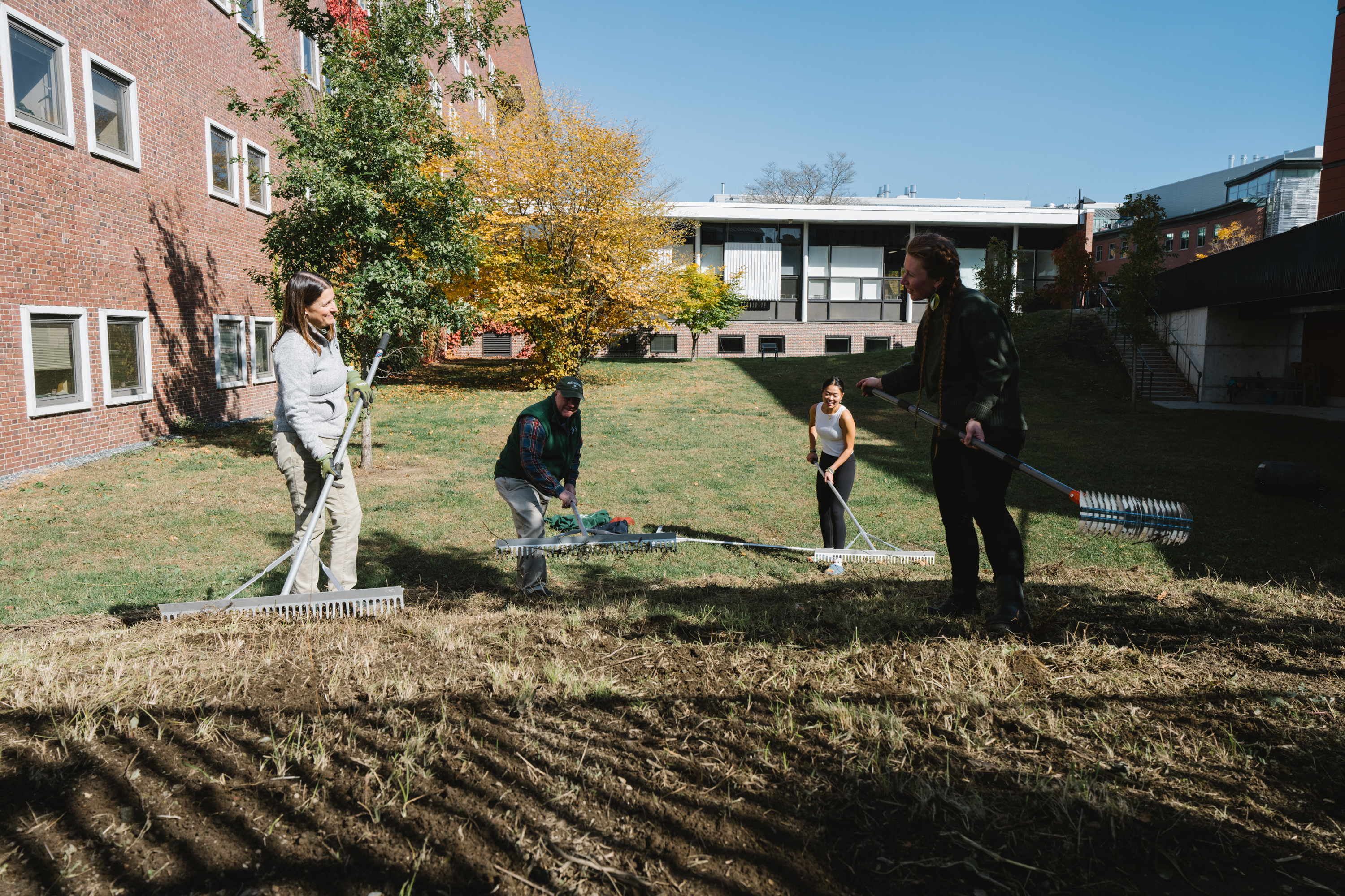 Students raking