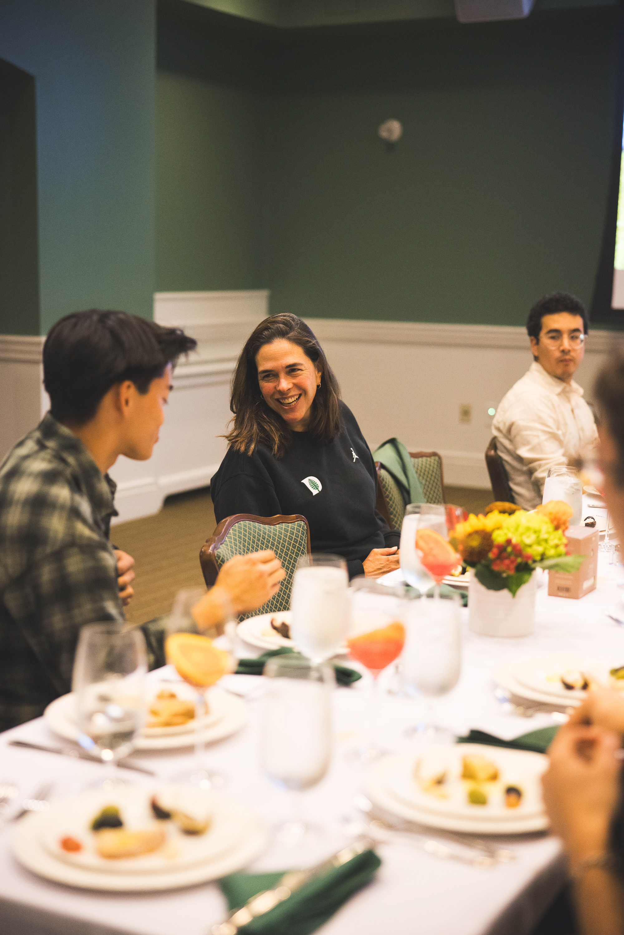 Sian enjoying dinner with students