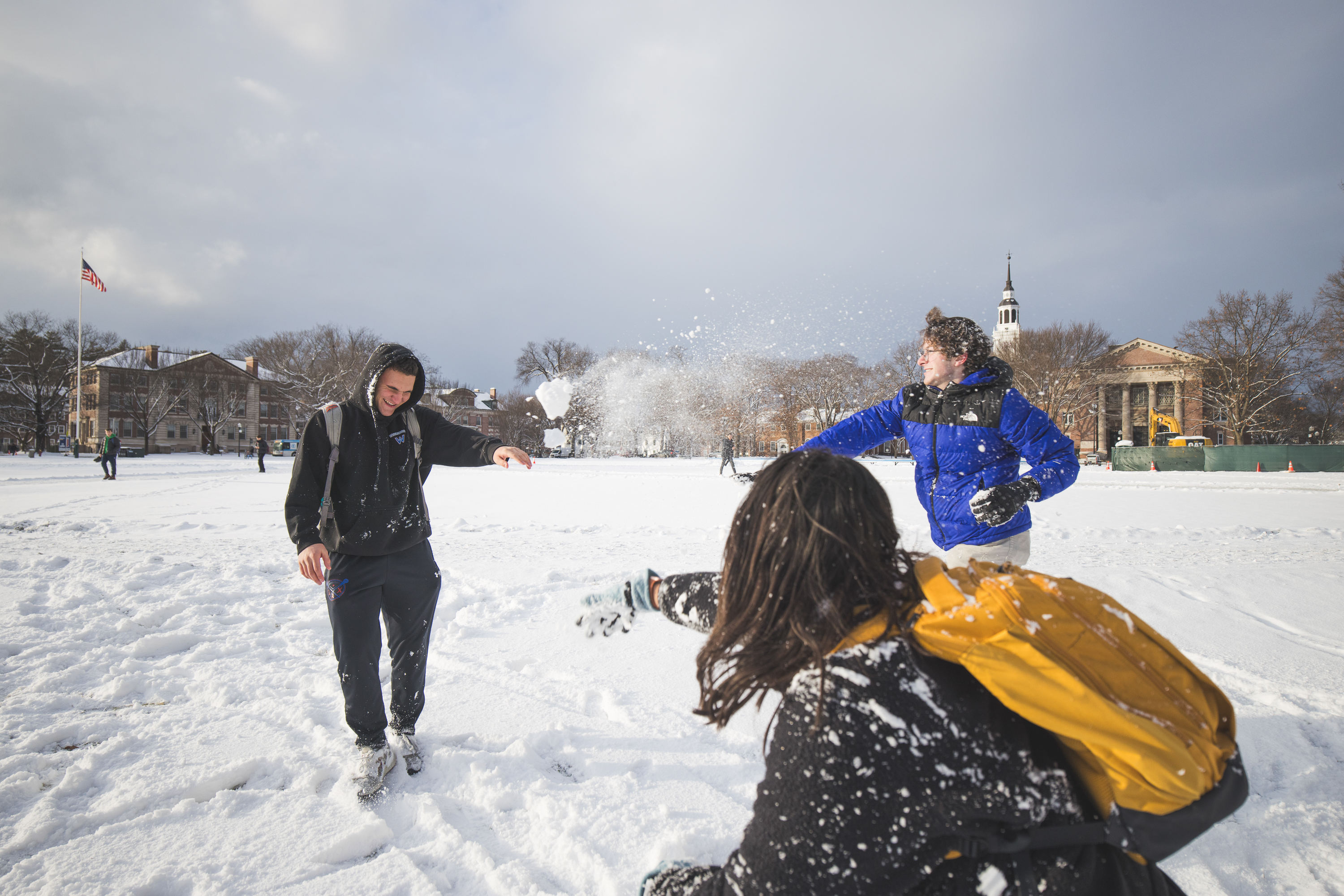 Anthony Piotrowski being playfully pelted by snowballs on the Green.
