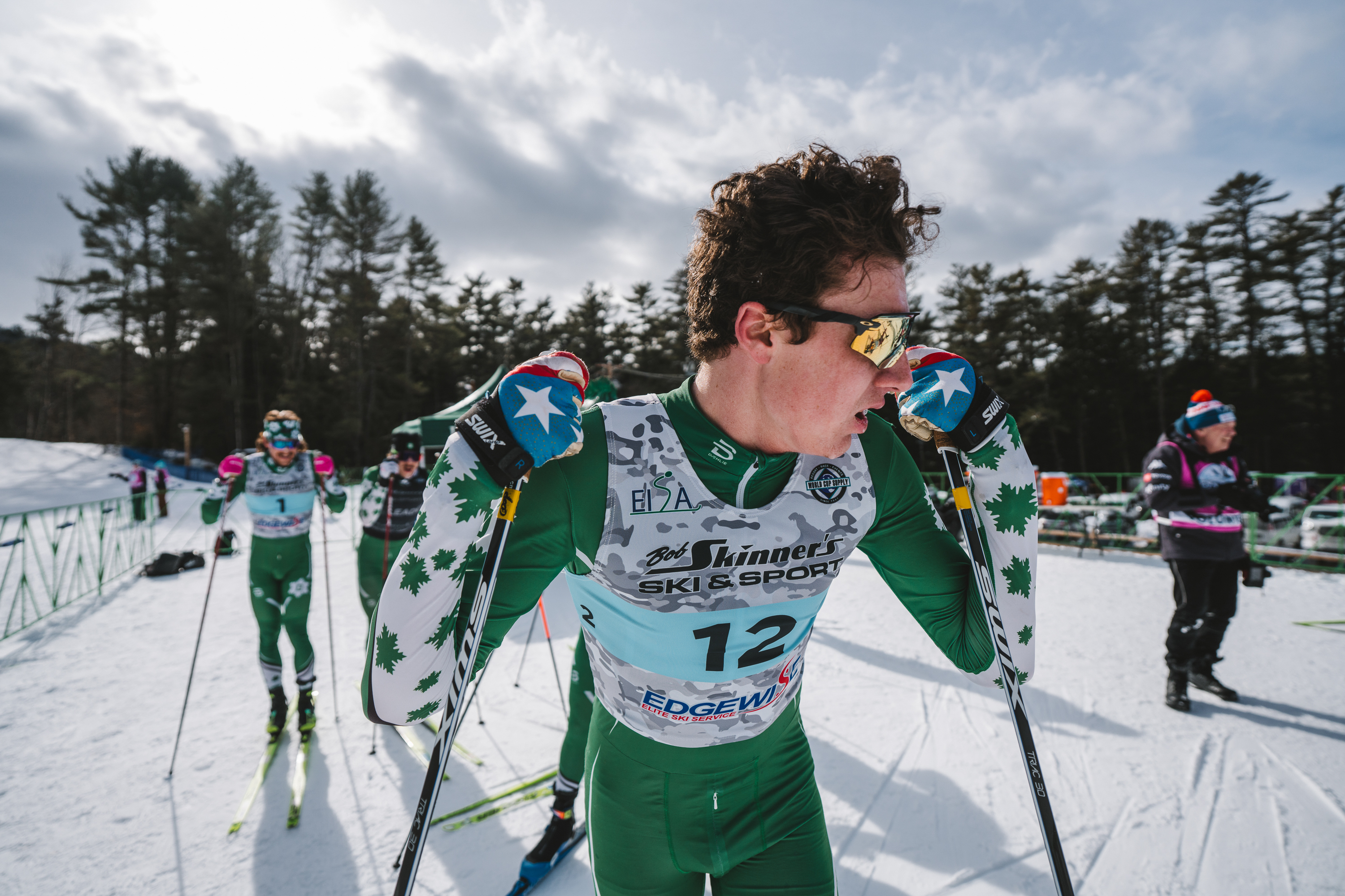 Male skiiers looking tired after a race