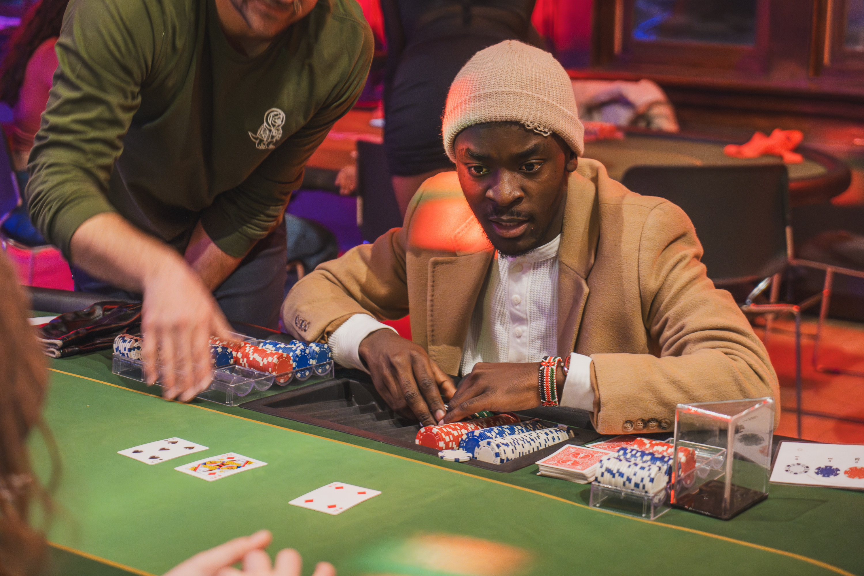 Maxwell Simba Owino partaking in a game of blackjack