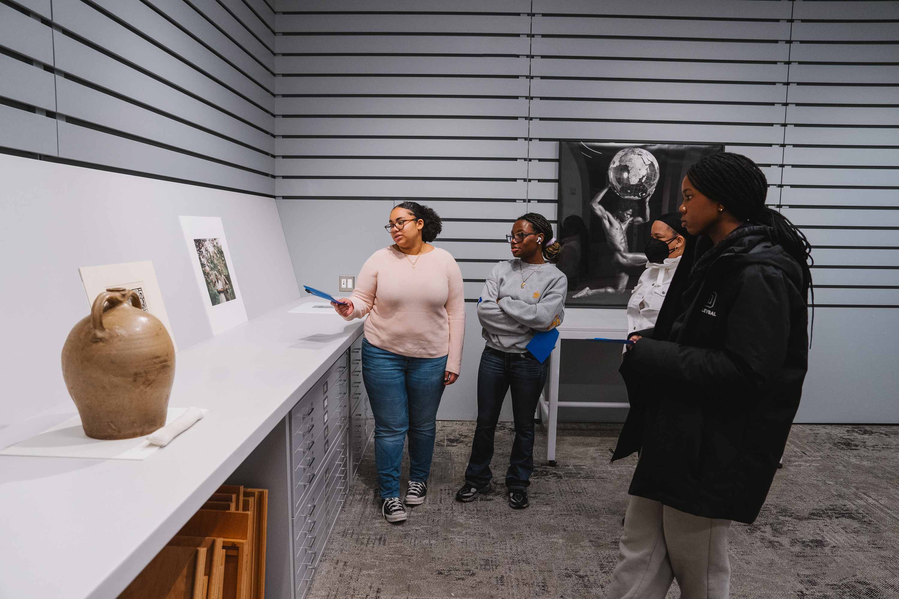Kayla Pena speaks on a photo in the HOOD