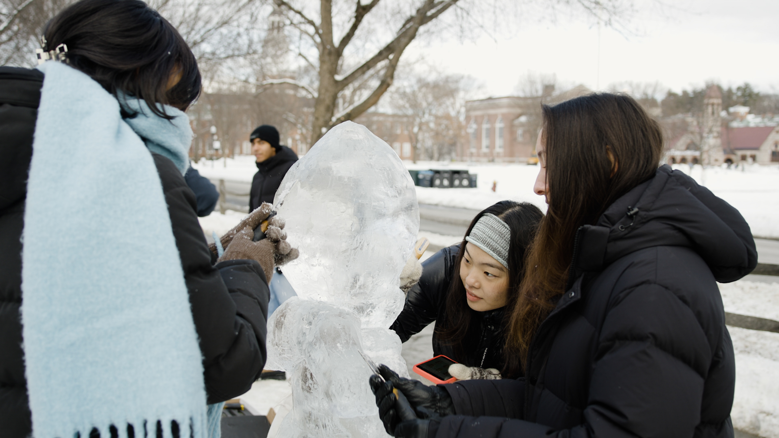 Students working on an ice scuplture