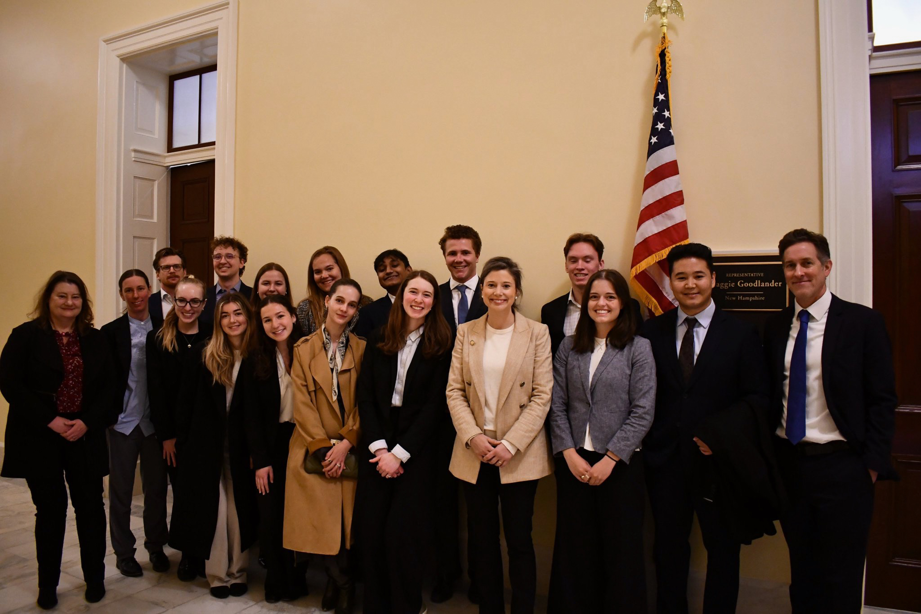 War & Peace Fellows standing with Maggie Goodlander