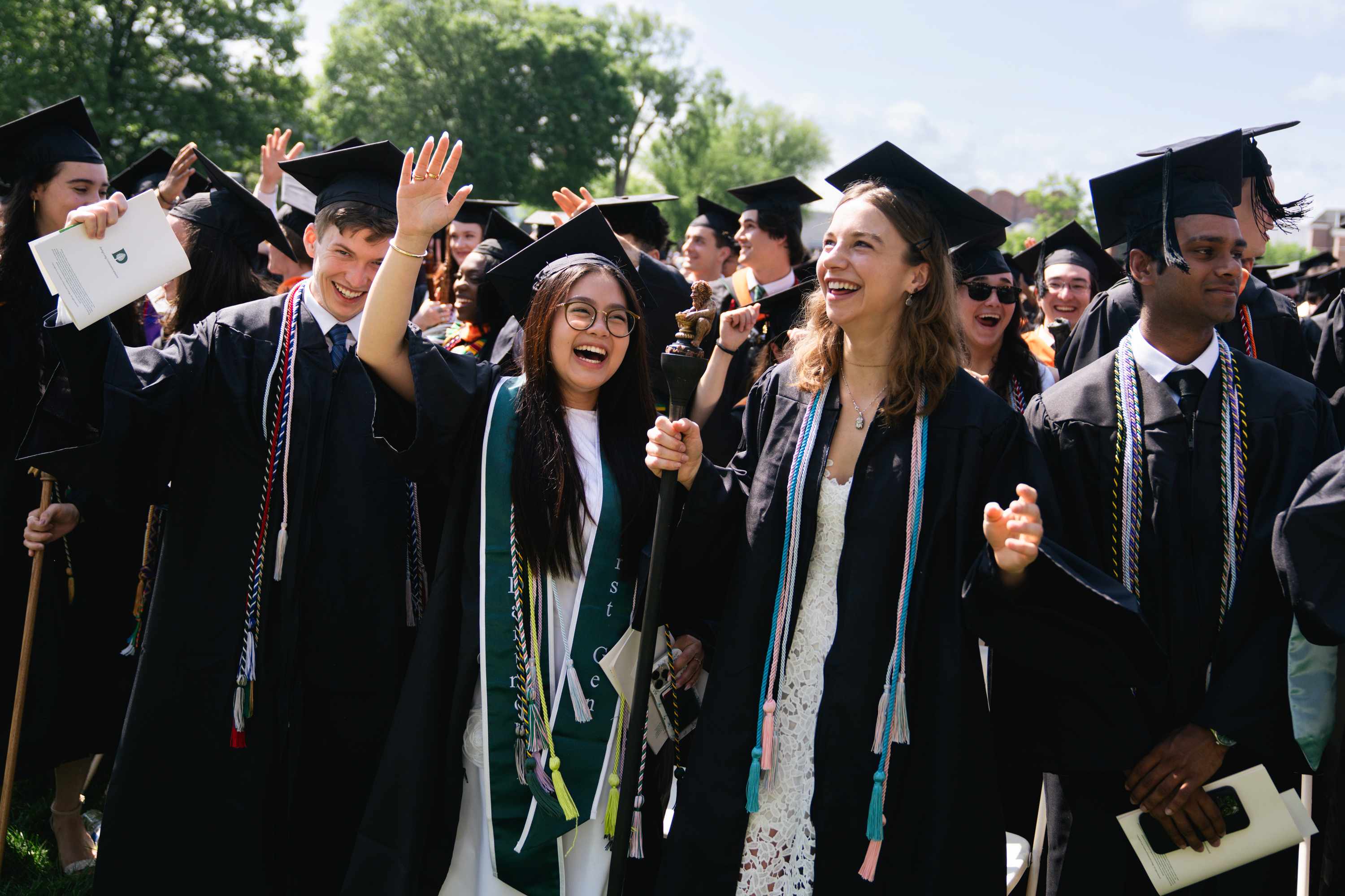 Students dancing at the end of the Commencement address.