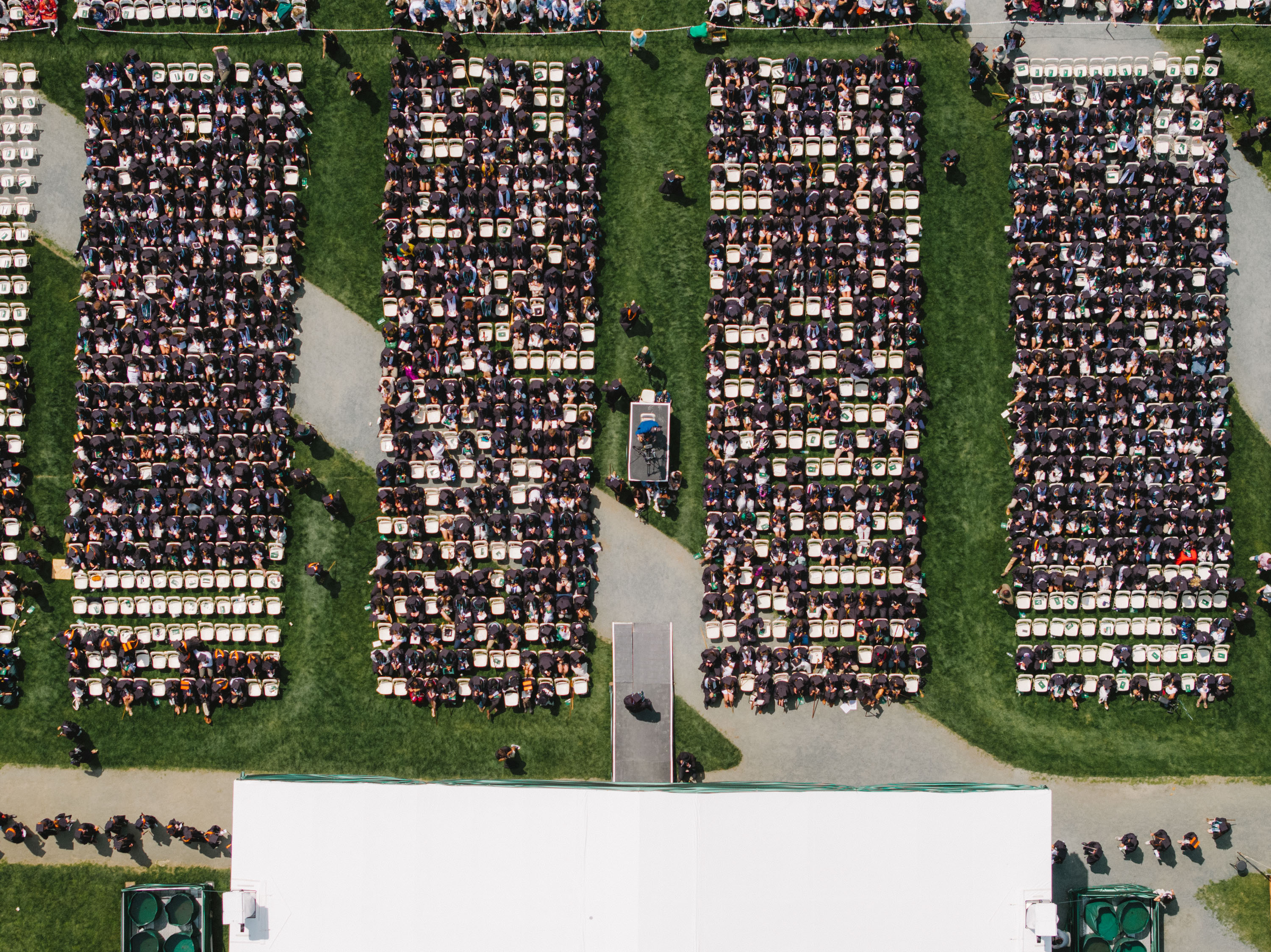 Birds-eye-view of graduates sitting at Commencement