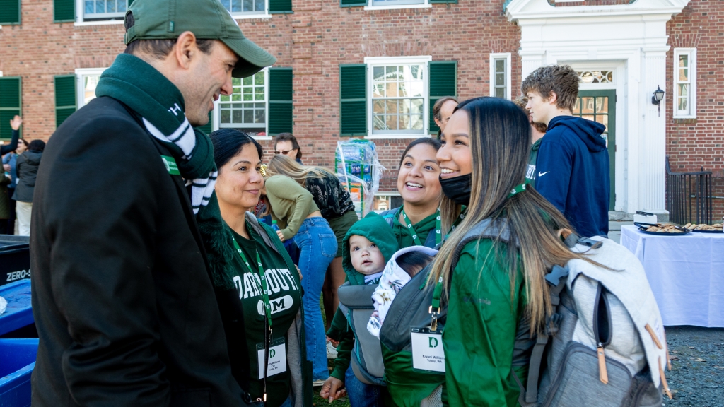 Interim dean Scott Brown talks with a family