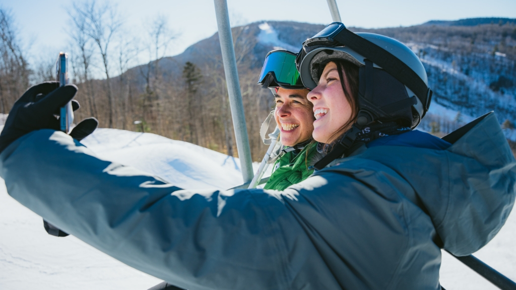 President Beilock and student take a selfie on the chairlift