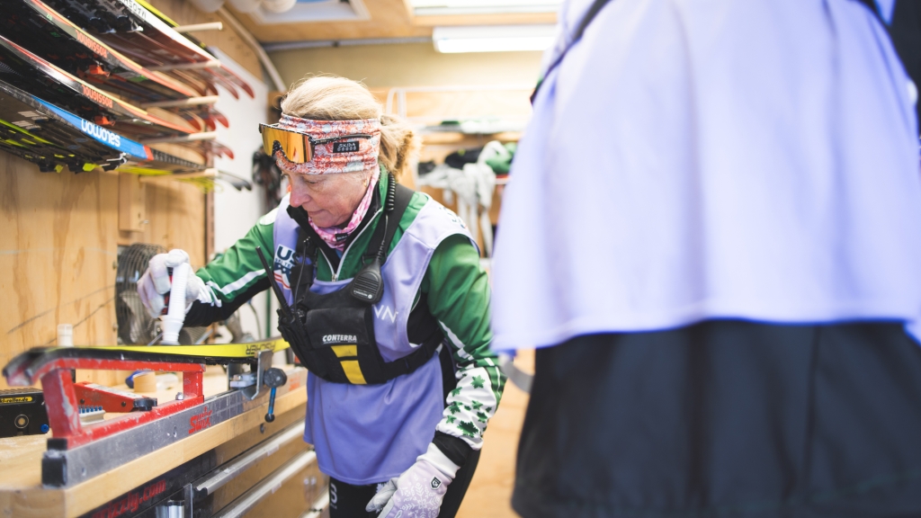 Nordic coaches wax student skis