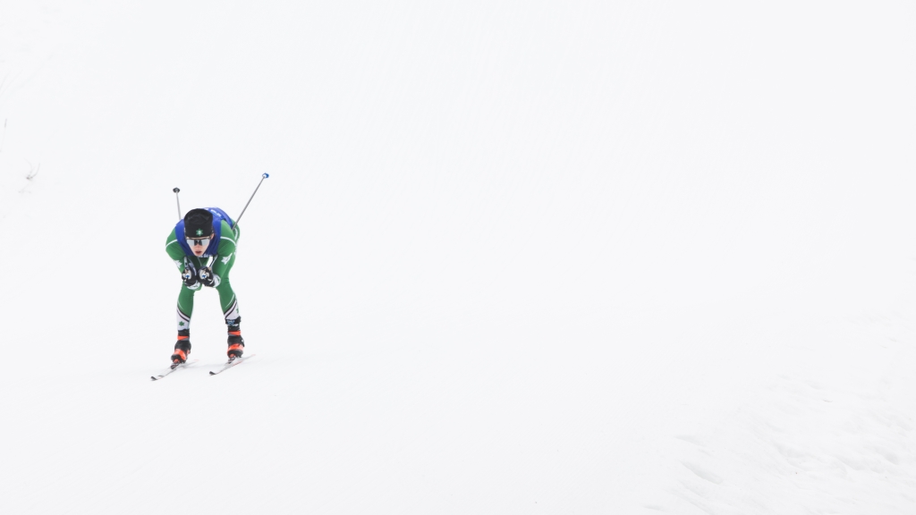 Student skiing nordic races at Oak Hill.