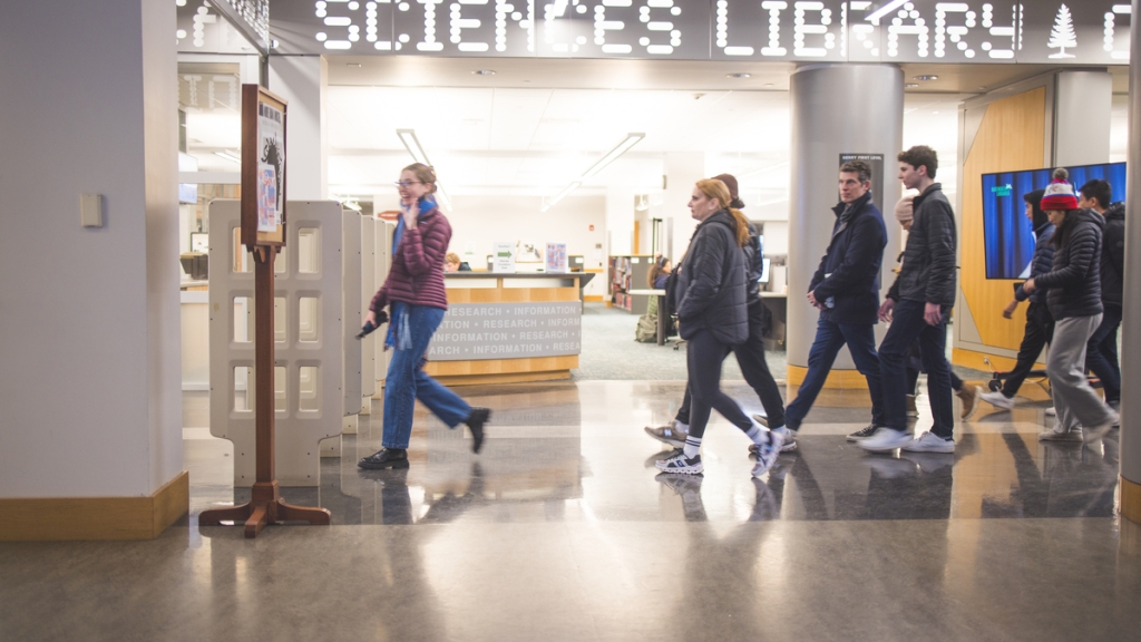 People walking in the Baker-Berry Library