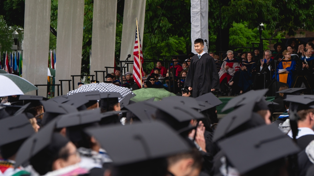 Brian Zheng giving his speech