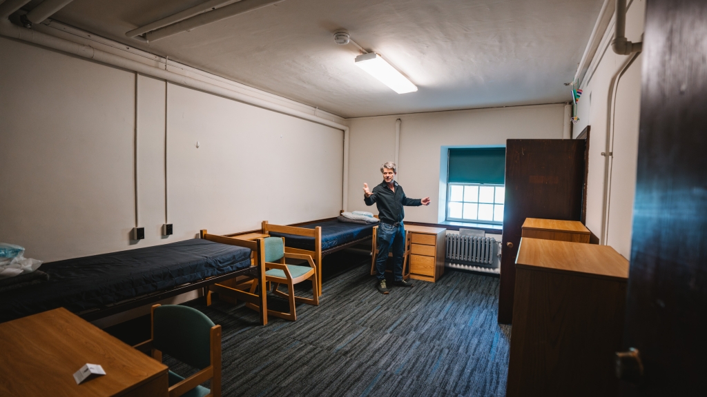Ed Lewis giving a tour of Fayerweather Hall