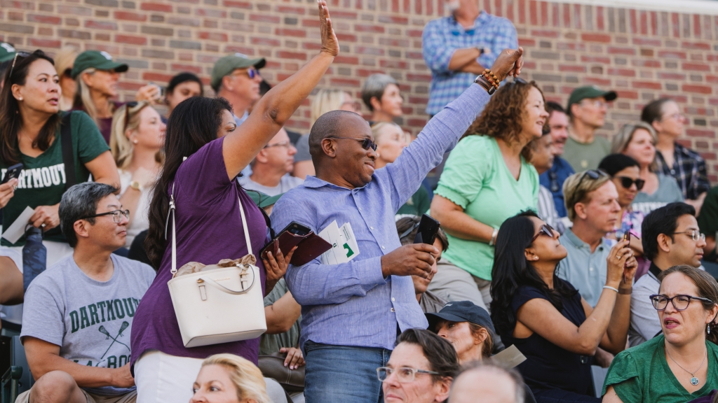 Parents waving to students