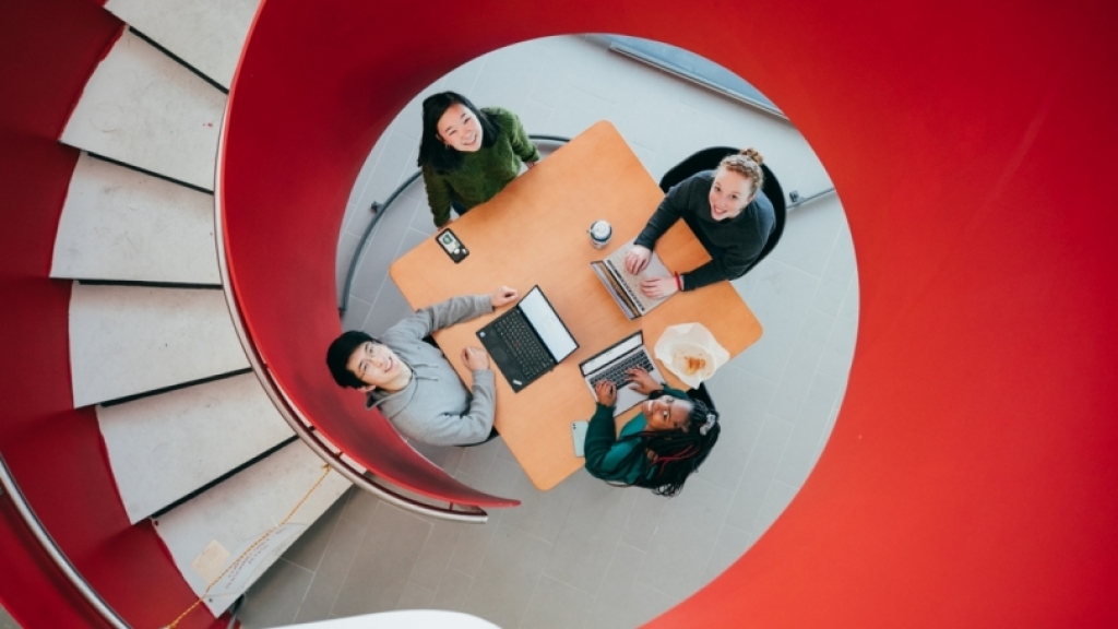 students by spiral staircase