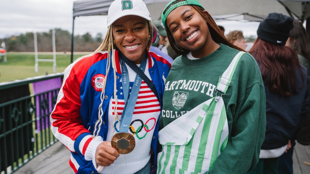 Ariana Ramsey holding Olympic medal