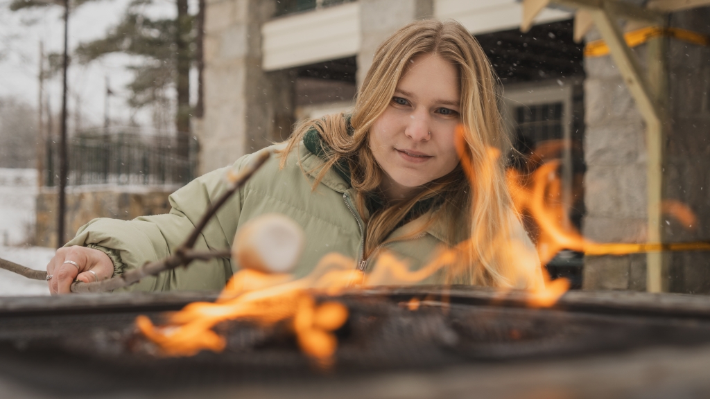 Linden Schaefer roasting a marshmallow