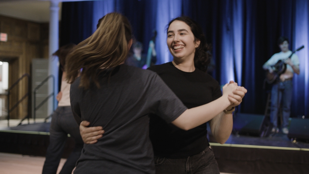 Students dancing at the Contra event