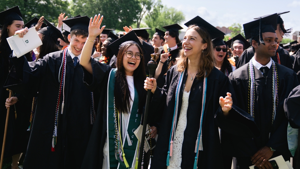 Students dancing at the end of the Commencement address.