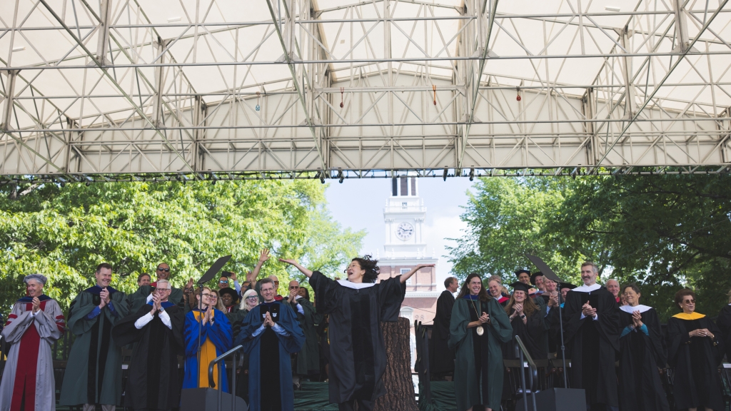 Commencement speaker Sandra Oh leads graduates and the audience in dancing